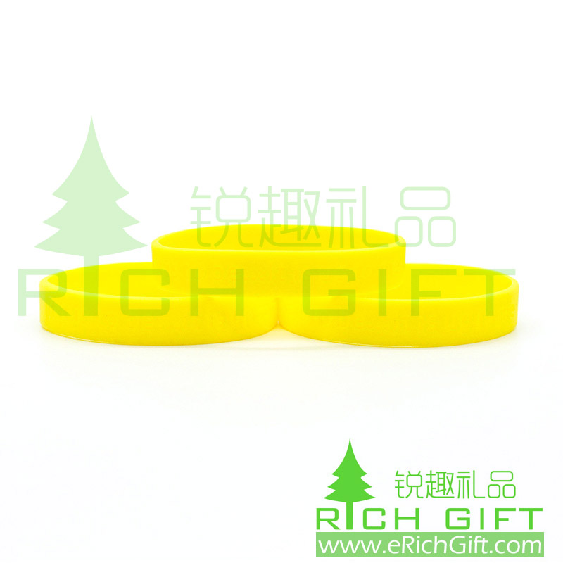 Yellow silicon wristband debossed  in adult size