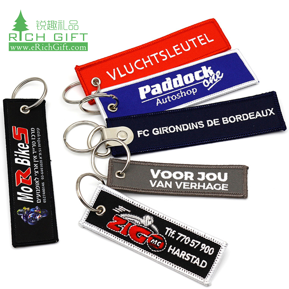 Free sample custom made promotional key chains label name brand cartoon anime double sided woven logo embroidery key chain