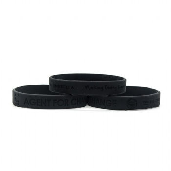 Black silicon wristband with debossed logo on outside